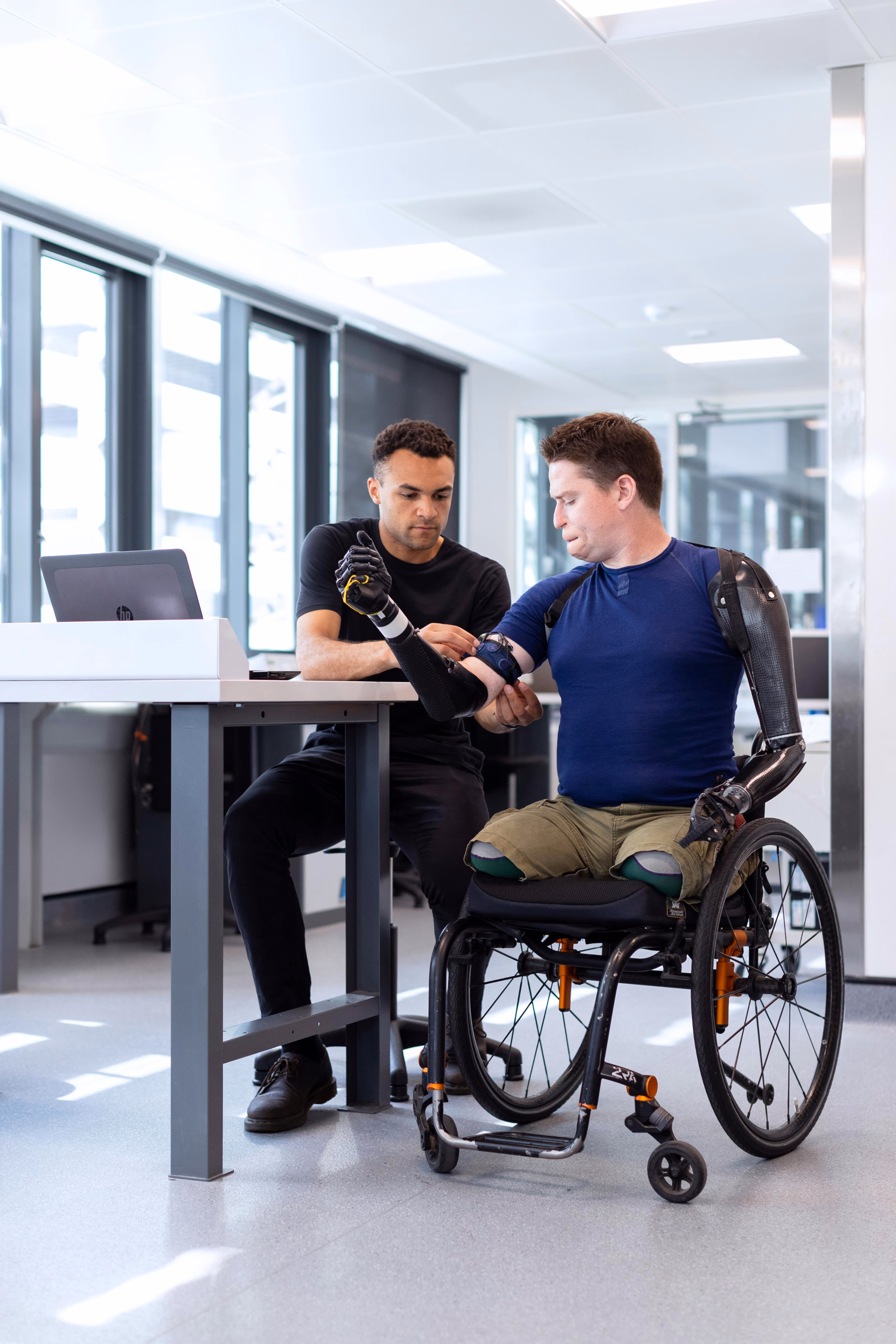 Person applying a medical device on a disabled person